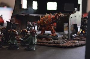 A hellbrute throws its weight around